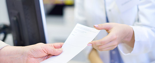 Patient Handing Prescription To Licensed Pharmacist For Compounding